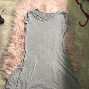 gray dress with cross hatch on the chest